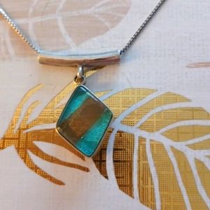 Dichroic glass pendant with chain